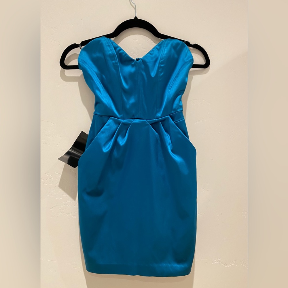 NWT, Bebe mini Crawford satin tulip dress size xs teal color.
